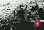 Image of German submarine U-564 reloads torpedo at sea Atlantic Ocean, 1942, second 50 stock footage video 65675062706