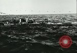 Image of German submarine U-564 reloads torpedo at sea Atlantic Ocean, 1942, second 52 stock footage video 65675062706