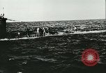 Image of German submarine U-564 reloads torpedo at sea Atlantic Ocean, 1942, second 55 stock footage video 65675062706