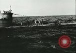 Image of German submarine U-564 reloads torpedo at sea Atlantic Ocean, 1942, second 56 stock footage video 65675062706