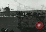 Image of German submarine U-564 reloads torpedo at sea Atlantic Ocean, 1942, second 57 stock footage video 65675062706