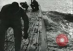 Immagine di Sommergibile tedesco di pattuglia Oceano atlantico, 1942, secondo 13 filmato di repertorio 65675062714