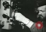 Standbild Deutsche Seeleute an Bord eines U-Bootes aus Nordamerika Saint Lawrence River North America, 1942, aus Sekunde 61 historischem Filmmaterial Videoclip 65675062717