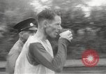 Image of 100 mile walking race United Kingdom, 1954, second 20 stock footage video 65675062763
