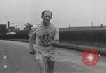 Image of 100 mile walking race United Kingdom, 1954, second 38 stock footage video 65675062763