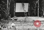 Image of U.S. troops in combat zones watch movies in World War II Pacific theater, 1943, second 60 stock footage video 65675062808