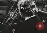 Image of telephone operator United States USA, 1944, second 3 stock footage video 65675062826