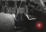 Image of telephone operator United States USA, 1944, second 8 stock footage video 65675062826