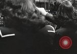 Image of telephone operator United States USA, 1944, second 10 stock footage video 65675062826