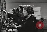 Image of telephone operator United States USA, 1944, second 18 stock footage video 65675062826