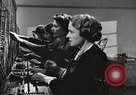 Image of telephone operator United States USA, 1944, second 19 stock footage video 65675062826