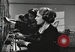 Image of telephone operator United States USA, 1944, second 20 stock footage video 65675062826