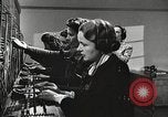 Image of telephone operator United States USA, 1944, second 21 stock footage video 65675062826