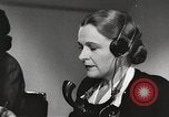 Image of telephone operator United States USA, 1944, second 22 stock footage video 65675062826