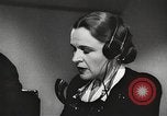 Image of telephone operator United States USA, 1944, second 52 stock footage video 65675062826