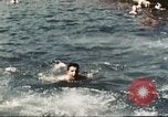 Standbild Outdoor Swimmingpool in England England, 1943, aus Sekunde 45 historischem Filmmaterial Videoclip 65675062853