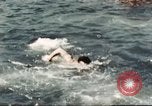 Standbild Outdoor Swimmingpool in England England, 1943, aus Sekunde 46 historischem Filmmaterial Videoclip 65675062853