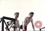 Standbild Outdoor Swimmingpool in England England, 1943, aus Sekunde 48 historischem Filmmaterial Videoclip 65675062853