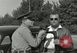 Image of taxicab driver Berlin Germany, 1959, second 24 stock footage video 65675062920