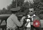 Image of taxicab driver Berlin Germany, 1959, second 27 stock footage video 65675062920