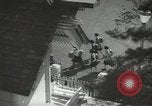 Image of Japanese children bow at shrine on the way to school Japan, 1939, second 3 stock footage video 65675062944
