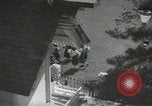 Image of Japanese children bow at shrine on the way to school Japan, 1939, second 4 stock footage video 65675062944