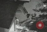 Image of Japanese children bow at shrine on the way to school Japan, 1939, second 6 stock footage video 65675062944