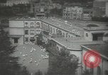Image of Japanese children bow at shrine on the way to school Japan, 1939, second 9 stock footage video 65675062944