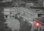 Image of Japanese children bow at shrine on the way to school Japan, 1939, second 10 stock footage video 65675062944