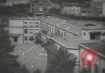 Image of Japanese children bow at shrine on the way to school Japan, 1939, second 13 stock footage video 65675062944
