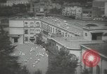 Image of Japanese children bow at shrine on the way to school Japan, 1939, second 15 stock footage video 65675062944
