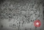 Image of Japanese children bow at shrine on the way to school Japan, 1939, second 16 stock footage video 65675062944