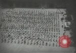 Image of Japanese children bow at shrine on the way to school Japan, 1939, second 21 stock footage video 65675062944