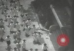 Image of Japanese children bow at shrine on the way to school Japan, 1939, second 30 stock footage video 65675062944