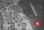 Image of Japanese children bow at shrine on the way to school Japan, 1939, second 31 stock footage video 65675062944