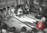 Image of Japanese children bow at shrine on the way to school Japan, 1939, second 36 stock footage video 65675062944