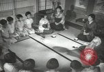 Image of Japanese children bow at shrine on the way to school Japan, 1939, second 37 stock footage video 65675062944