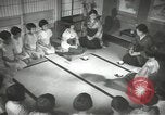 Image of Japanese children bow at shrine on the way to school Japan, 1939, second 38 stock footage video 65675062944
