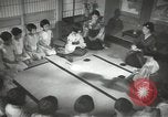 Image of Japanese children bow at shrine on the way to school Japan, 1939, second 42 stock footage video 65675062944