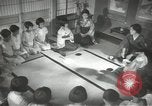 Image of Japanese children bow at shrine on the way to school Japan, 1939, second 48 stock footage video 65675062944