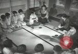 Image of Japanese children bow at shrine on the way to school Japan, 1939, second 50 stock footage video 65675062944