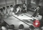 Image of Japanese children bow at shrine on the way to school Japan, 1939, second 53 stock footage video 65675062944