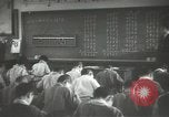 Image of Japanese children bow at shrine on the way to school Japan, 1939, second 58 stock footage video 65675062944