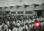 Image of Workers exercise before entering a factory Japan, 1939, second 3 stock footage video 65675062946