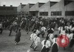 Image of Workers exercise before entering a factory Japan, 1939, second 5 stock footage video 65675062946