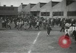 Image of Workers exercise before entering a factory Japan, 1939, second 7 stock footage video 65675062946