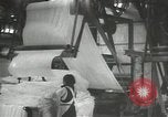 Image of Workers exercise before entering a factory Japan, 1939, second 20 stock footage video 65675062946