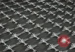 Image of Workers exercise before entering a factory Japan, 1939, second 24 stock footage video 65675062946