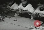 Image of Workers exercise before entering a factory Japan, 1939, second 27 stock footage video 65675062946