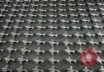 Image of Workers exercise before entering a factory Japan, 1939, second 34 stock footage video 65675062946